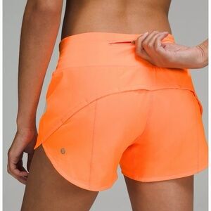 Neon orange Lululemon shorts! NWOT